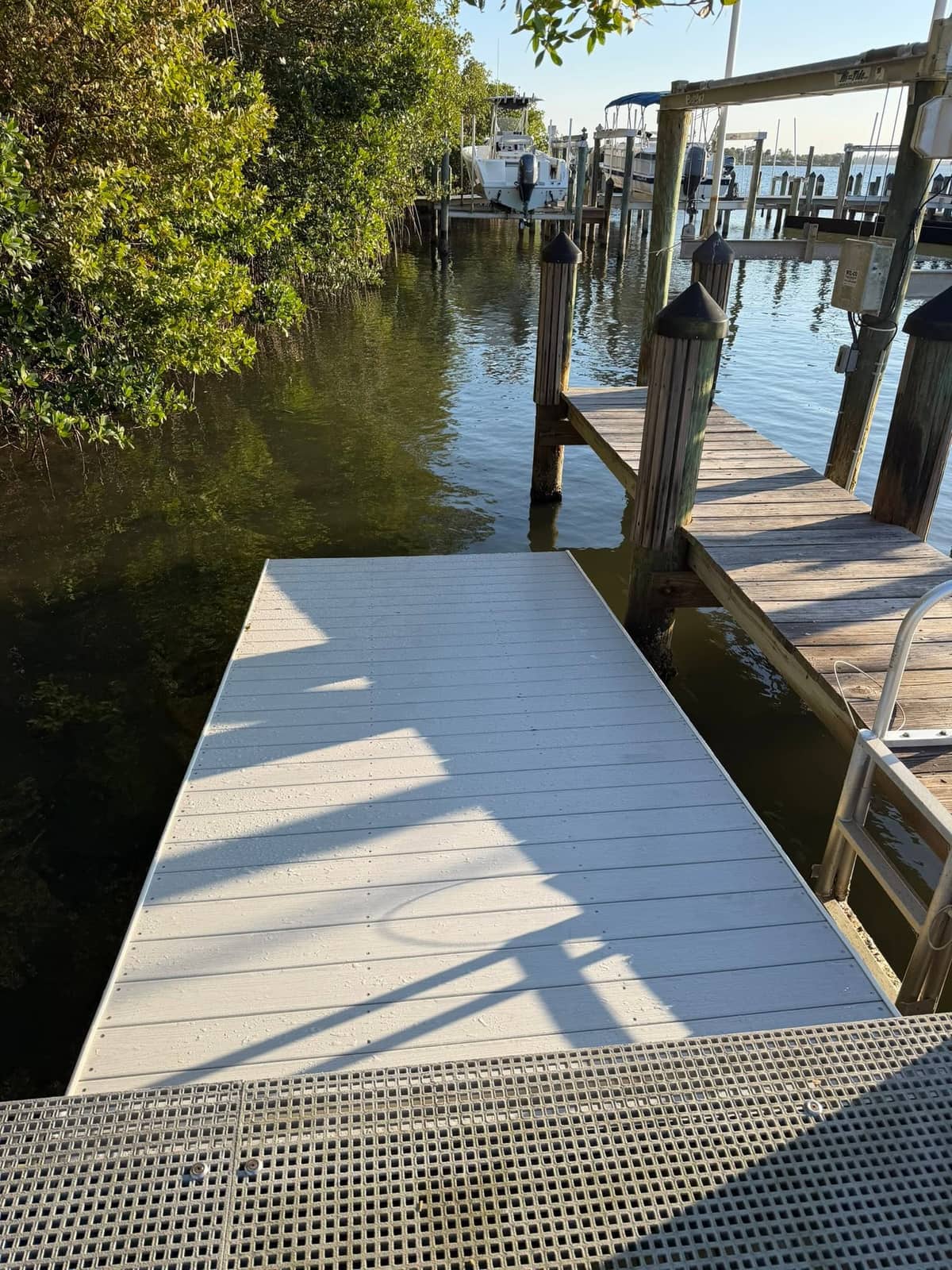 GRV dock build with a view toward the canal and neighboring boat docks